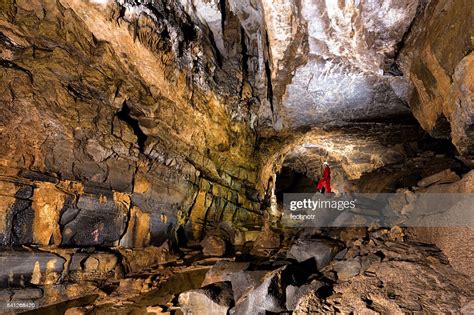 Caver Posing In The Beautiful Colorful Cave High Res Stock Photo