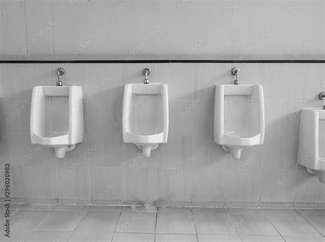 Empty Row Of Outdoor Urinals Men Public Toiletclose Up White Urinals In Mens Bathroomwhite