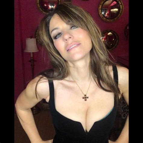 Elizabeth Hurley Sexy At Christmas Eve 9 Photos The Fappening