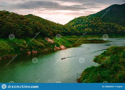 Landscape Picture Of River Mountain Forest Fishing Boat And Stock