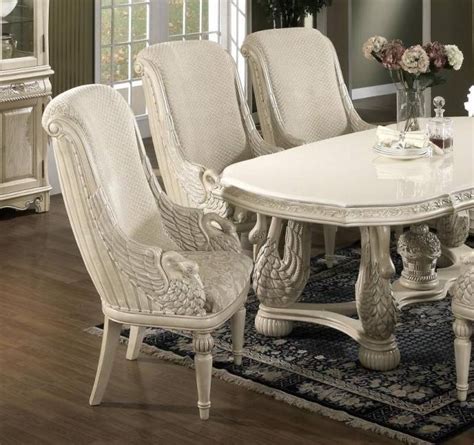 The coordinating chair sets in this line are in dark wood with neutral upholstered cushions. MYCO Furniture Avignon Classic Ivory Finish Carved Wood ...