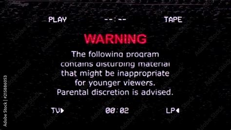 A Retro Vintage Old VHS Tape Screen Capture With Noise And Distortion Showing A Warning
