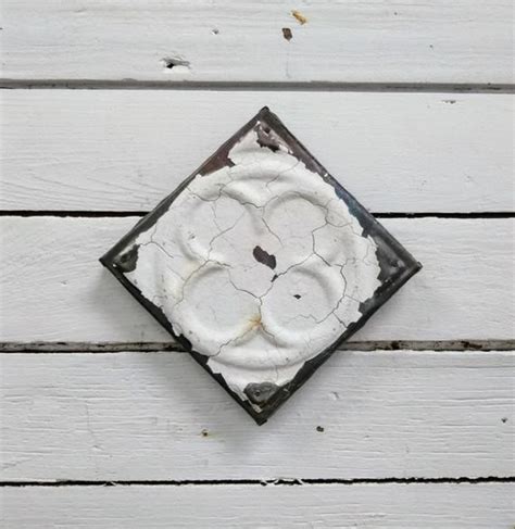 Tin or pressed plastic ceiling tiles can give a room an elegant, unique look. Pressed Tin Square Ceiling Tile Architectural Salvage ...