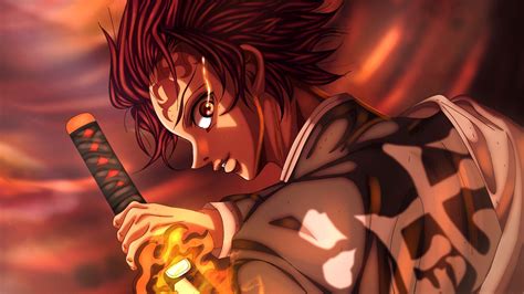 Demon Slayer Tanjiro Kamado Having Fire Sword With Blur Background Hd