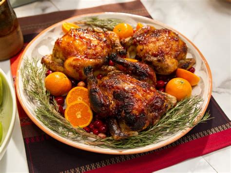 Place in the oven and roast for 45 to 60 minutes, or until the juices run clear. Clementine and Cranberry Glazed Cornish Game Hens Recipe ...