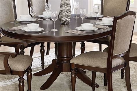 Versatile designs, unique shapes and alluring colours that can complement your dining room. Marston Brown Pedestal Oval Extendable Dining Table from ...