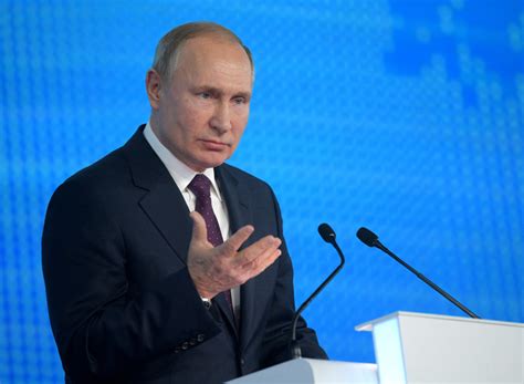 putin signs bill targeting journalists and bloggers pbs newshour