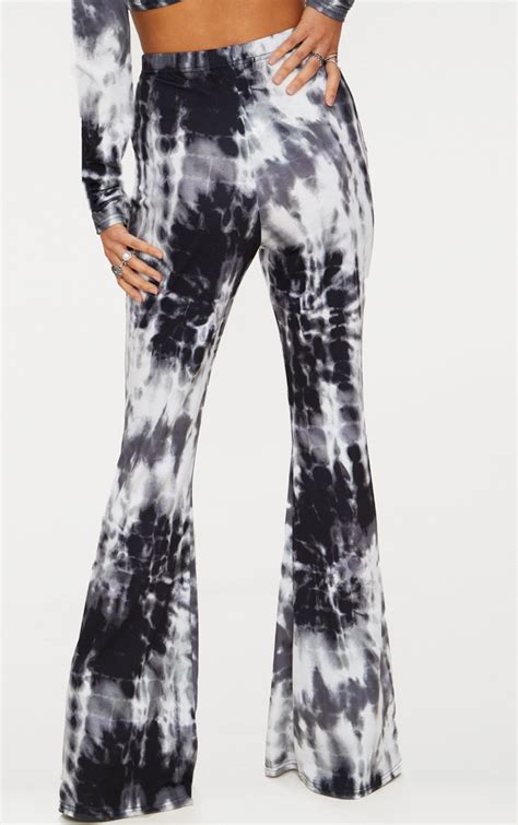 Black Tie Dye Flared Pants Prettylittlething Ca