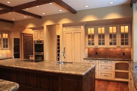 Water can quickly seep into walls and kitchen cabinets after a burst pipe, flood or other event. wood floor, white cabinet, we could do t & g ceiling and ...
