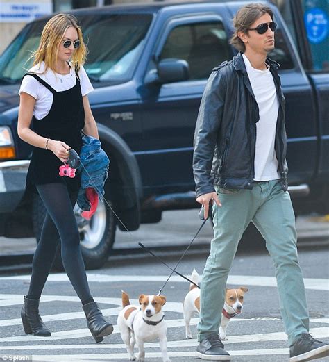 Candice Swanepoel Takes Her Cute Pooches For A Walk With Her Rarely
