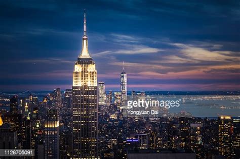 Empire State Building And New York City Skyline At Night High Res Stock