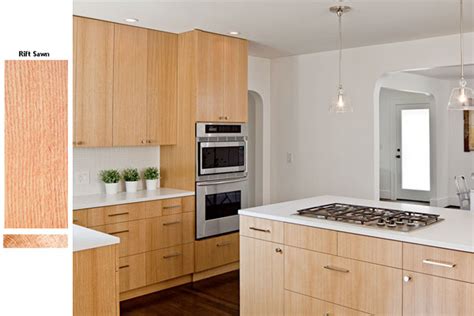 Love white kitchen cabinetry with light grey marble counter tops! Rift Sawn Oak Cabinets - Martinique