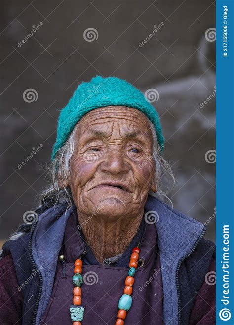 Old Buddhist Woman On The Street Next To The Monastery Lamayuru In