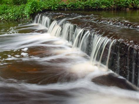 Small Waterfall Cascade On River With Motion Blur Stock Photo Image