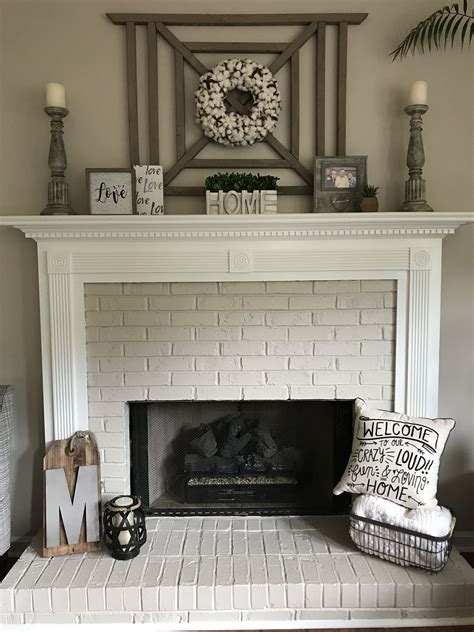 Painted Brick Fireplace And Mantle With Cotton Wreath Brick Fireplace
