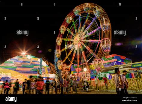 Creative Collage Of A Night Scene At Star City Manila