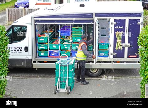 Tesco Supermarket Home Delivery Van Open Side Of Groceries In Food