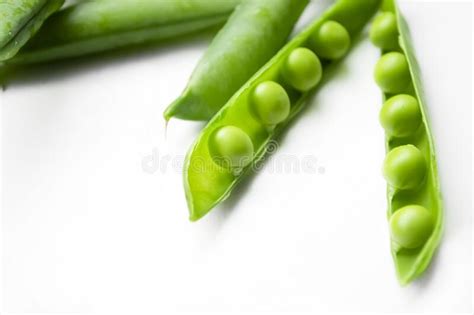 Peas In A Pod On A White Background Green Peas On A White Background