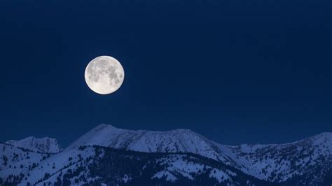 Snow Moon Setting Over Elkhorn Mountain Youtube
