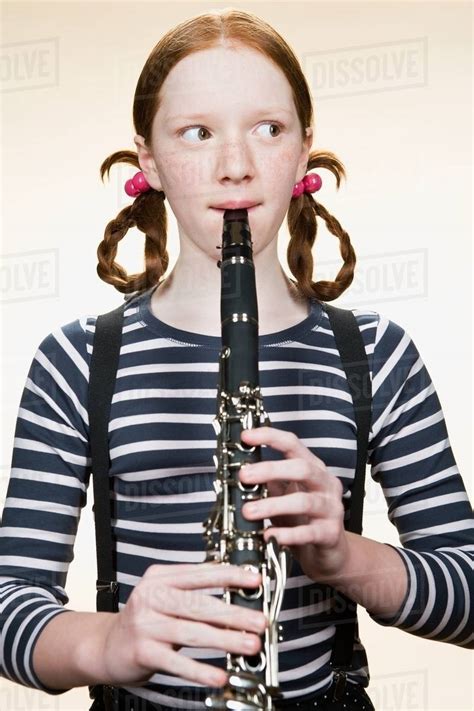 Portrait Of A Girl Playing A Clarinet Stock Photo Dissolve