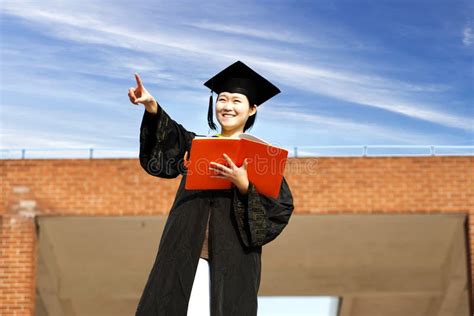 Female Graduate Wearing Graduation Gown Stock Photo Image Of Degree