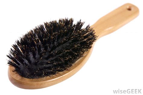 Thick hair often makes it difficult to situate the bangs and hold them in place. Using Hairbrush made with Boar Bristles: Permissible?