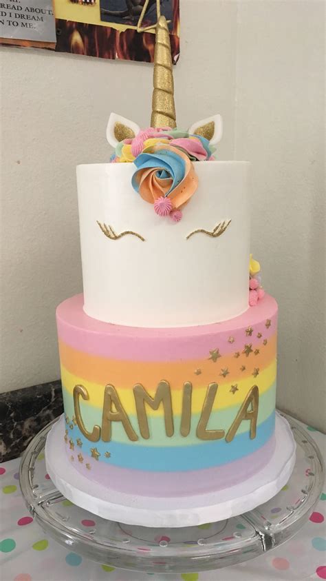 I pipe different color buttercream in rosettes, add a horn, eyelashes, ears, sprinkles, and 2 tier alternating layers of vanilla and chocolate cake filled with italian meringue buttercream and dulche de leche. Magical 2 tier unicorn rainbow cake (Rainbow Cake ...