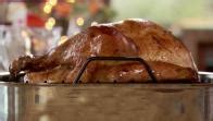 Remove the turkey from its packaging and remove the bags with the neck and giblets from the cavity. Roasted Thanksgiving Turkey Recipe | Ree Drummond | Food Network