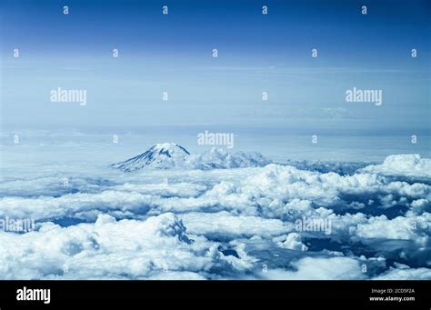 Mountain Peak Above Clouds High Resolution Stock Photography And Images