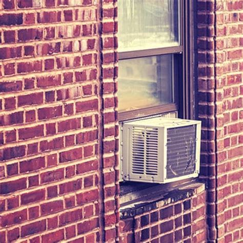 Attach the latch to the window and the frame. How to Install a Window Air Conditioner (in Double-Hung ...