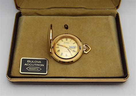 Vintage Bulova Accutron Quartz Pocket Watch In Hunter Case Day Date Textured Goldtone Case