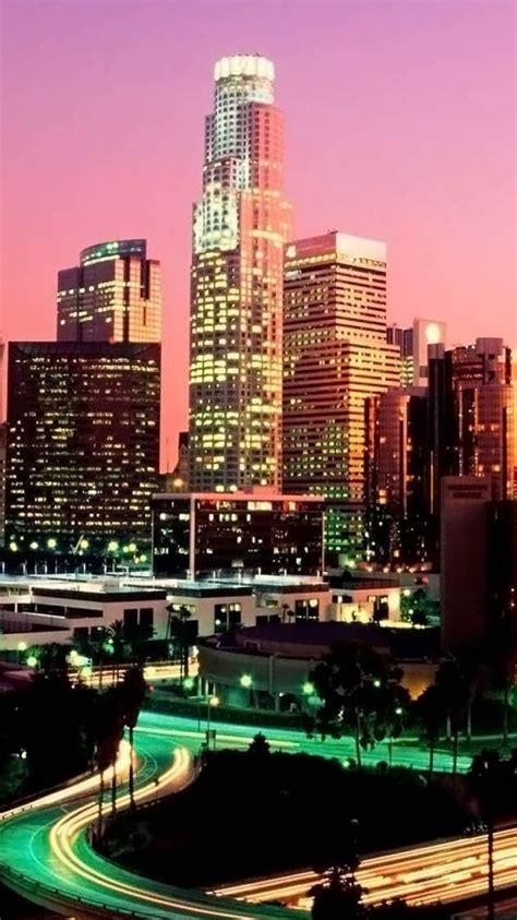 Download Wallpaper 750x1334 Los Angeles Skyscrapers Night Road