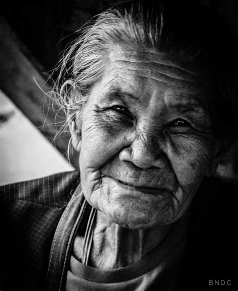 An Old Woman With Wrinkles On Her Face