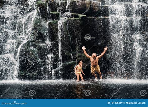 Many People Bathe In A Waterfall People At The Cave Waterfall Stock Image Image Of Blue