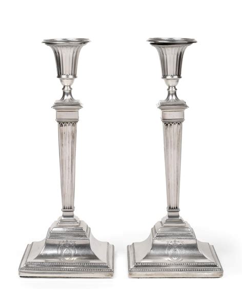 Lot 521 A Pair Of George Iii Silver Candlesticks