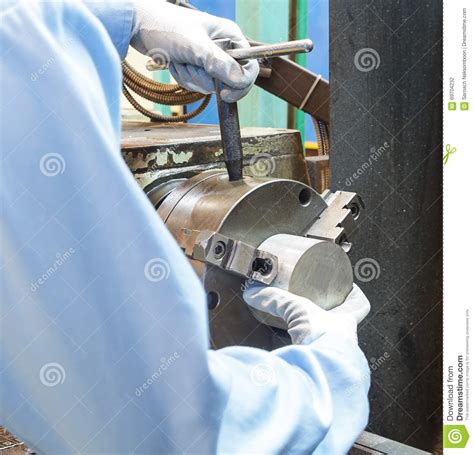 Operator Setup Turning Part On Manual Lathe Machine Stock Photo