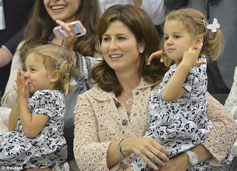 The 'twin thing' delighted the tennis community. Wimbledon 2012: Roger Federer's twin daughters cheer as their father takes seventh singles title ...
