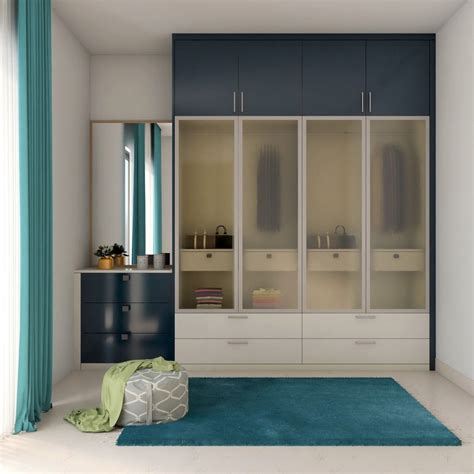 Modern White And Blue Wardrobe Design With Frosted Glass Door Livspace