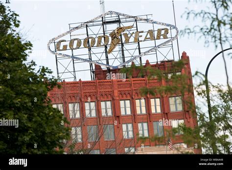 A Logo Sign Outside Of The Former Headquarters Of The Goodyear Tire Rubber Company In Akron