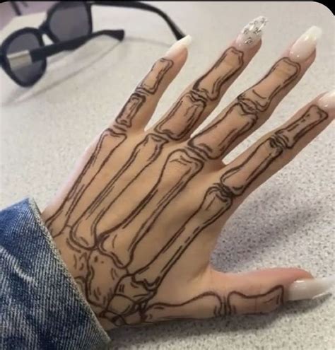 Skeleton Hand Tattoo On Arm 50 Skeleton Tattoos For Men Spine