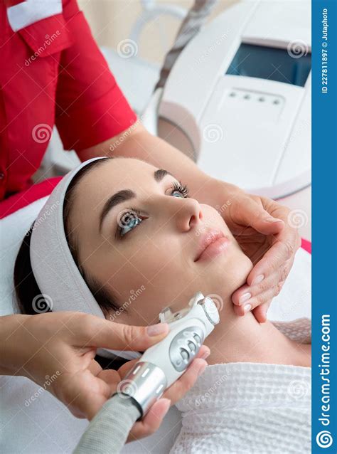 Rejuvenating Facial Treatment Model Getting Lifting Therapy Massage In A Beauty Spa Salon Stock