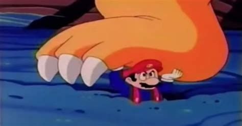 Mario Lifting Up The Huge Foot Of Bowser In The Mario Bros Anime