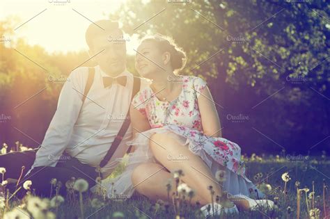 Couple In Love Flirting On The Grass High Quality People Images ~ Creative Market
