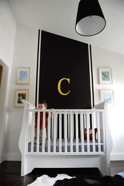 In our black and white emily & meritt nursery, we combined horizontal and vertical stripes with repeating triangles, diamonds. Chase's Black, White & Yellow Nursery - Project Nursery