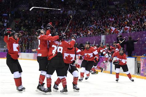 canadian women rally to beat u s in overtime for hockey gold