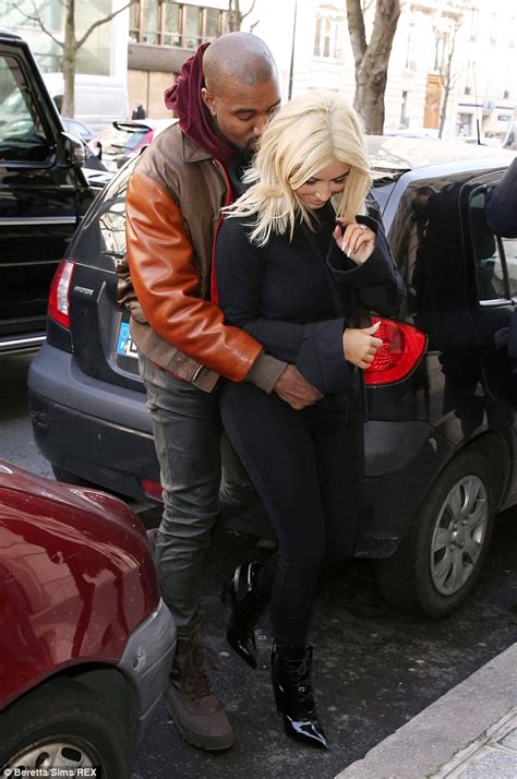 Kim Kardashian Gets The Giggles As Over Amorous Kanye West Makes A Grab For Her Famous Derriere