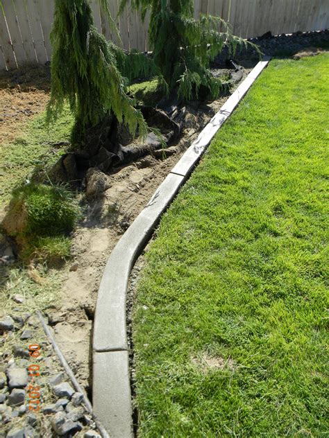 Custom concrete lawn edging starts with 545 lawn. Home Is Where They Love You: DIY Landscaping Curb