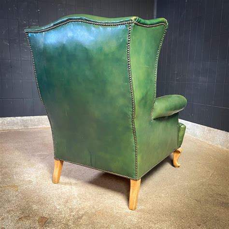 Vintage Green Leather Wingback Armchair For Sale At Pamono