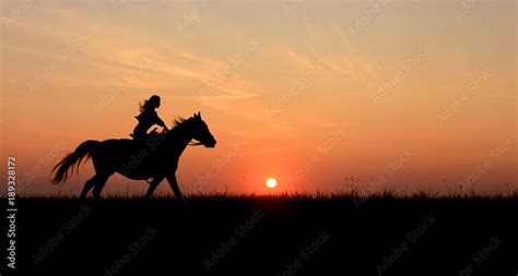 Photo Stock Horseback Woman Riding On Galloping Horse With Red Rising