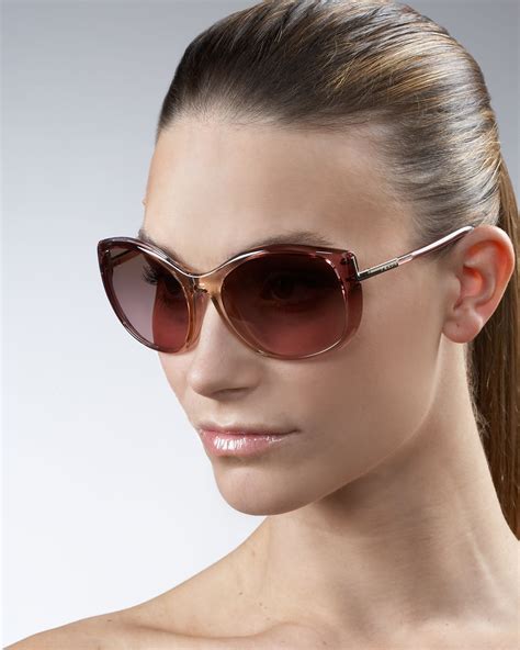 Lyst Prada Oversized Cat Eye Sunglasses In Brown